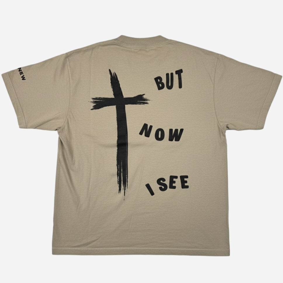 oatmeal colored christian merch shirt with but now i see next to a cross from faith-based apparel brand CRE8NEW
JESUS LOVES YOU